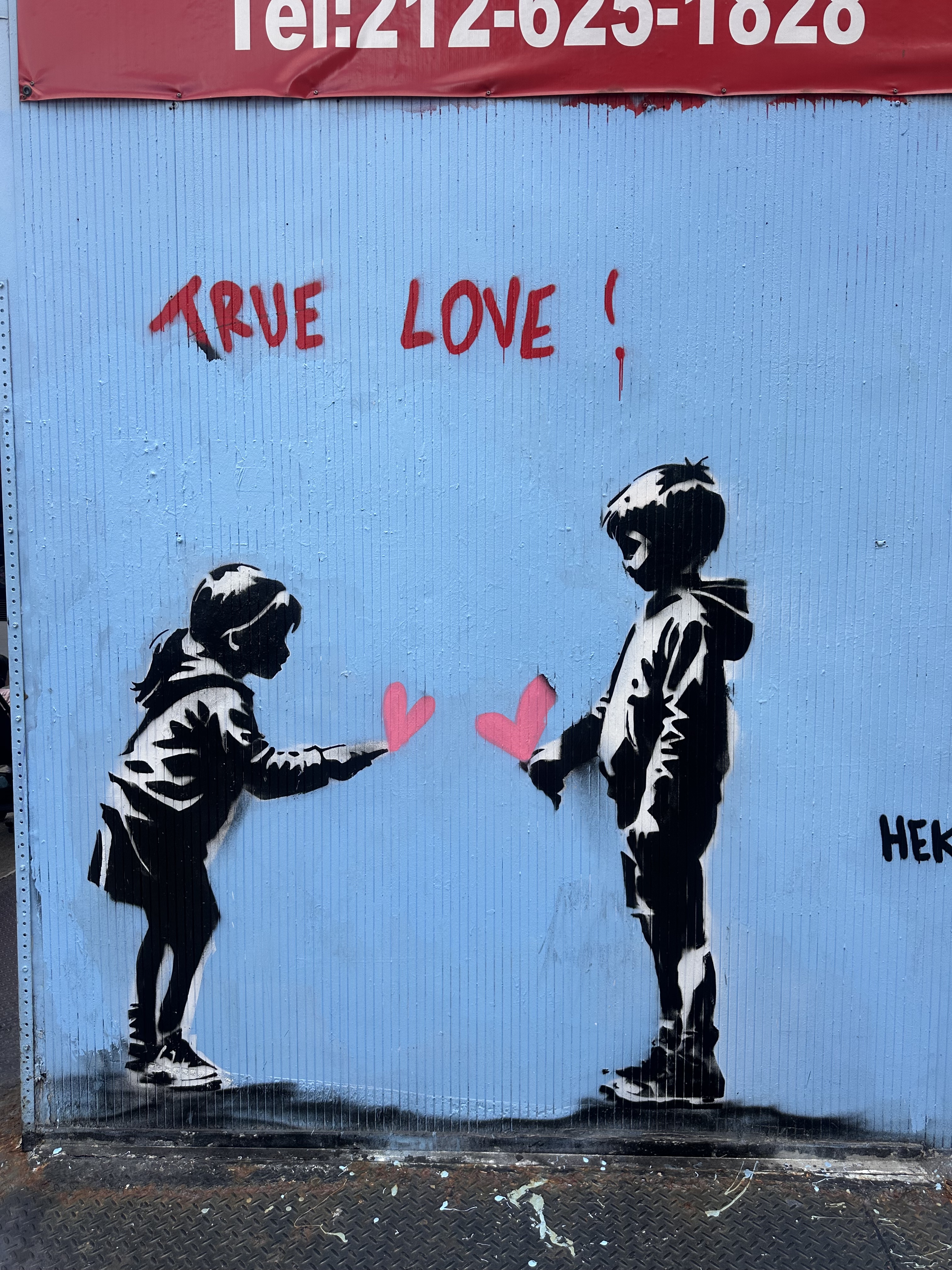 Tall arched Art Deco window with decorative metalwork — London